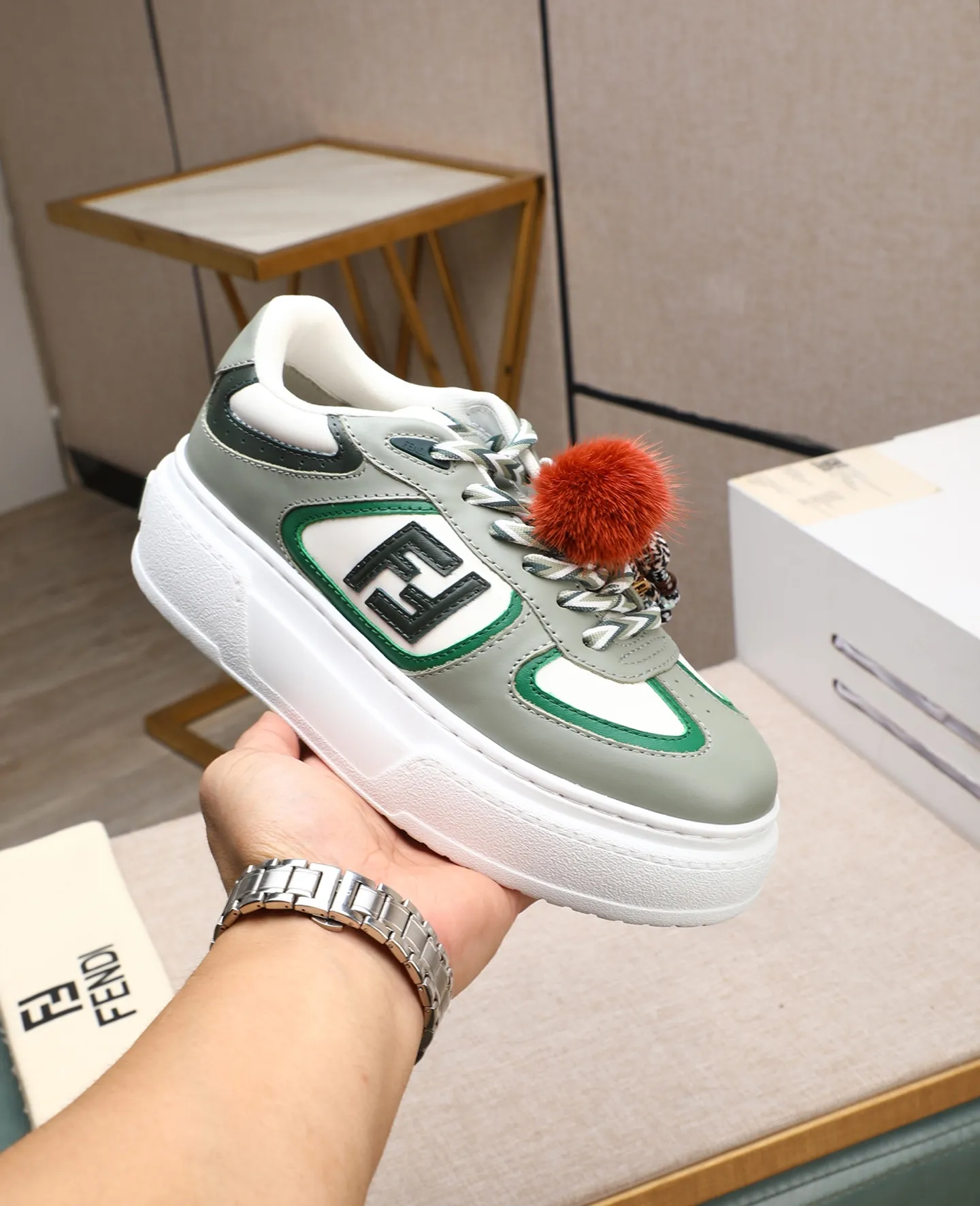 Men's shoes 💰740 Top quality Fendi Match series 25 latest colors Pendant thick sole lace casual FENDI Match lace. Made of light pink leather with white and ocher brown details. Contrast leather FF appliqué on the sides and hiking laces in white, pink and ocher brown. Thick rubber sole with oversized embossed FENDI lettering on the heel. Metal ring charm on the tongue: A small braided doll with contrasting mink fur details and gold metallic FF on the right shoe. The left shoe features a braided cord with contrasting mink double pom poms, metallic FF beads, and Pequin print pattern and logo. Upper: Original custom-made imported first-layer cowhide. Inner lining: Imported custom-made breathable mesh lining. Sole: Original open-molded ultra-light foam material. Bottom thickness: 5CM. Number of yards: women's 35-40 (custom-made 40 non-refundable).